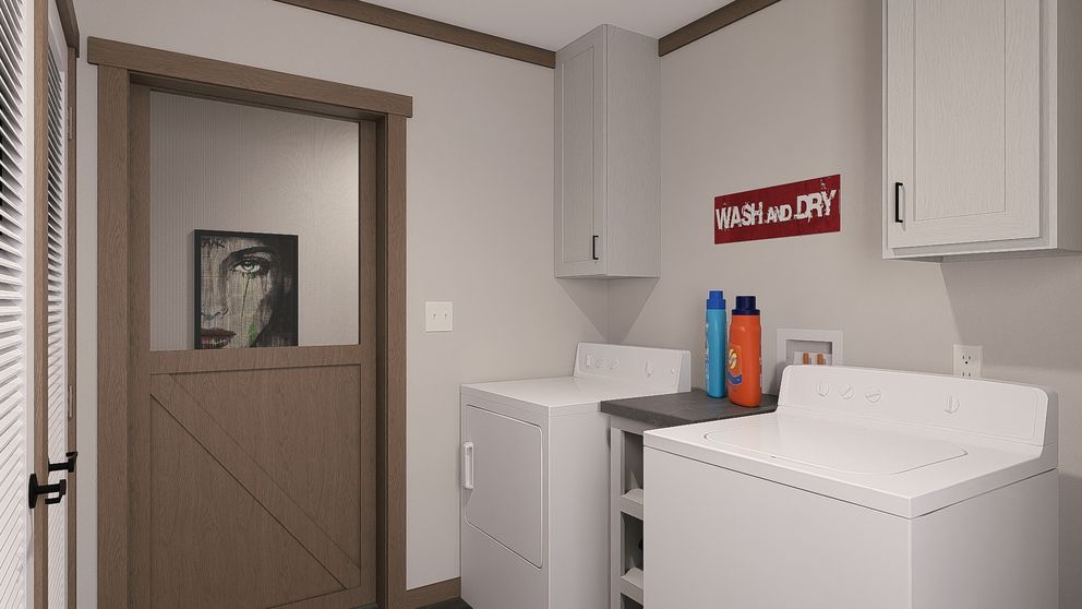 The EVERETT Utility Room. This Manufactured Mobile Home features 4 bedrooms and 3 baths.