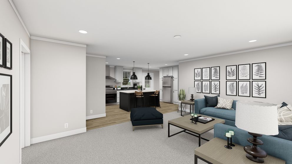The LET IT BE Living Room. This Manufactured Mobile Home features 3 bedrooms and 2 baths.