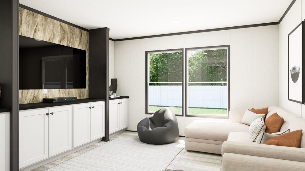 The THE MOUNTAINEER 56 Den. This Manufactured Mobile Home features 3 bedrooms and 2 baths.