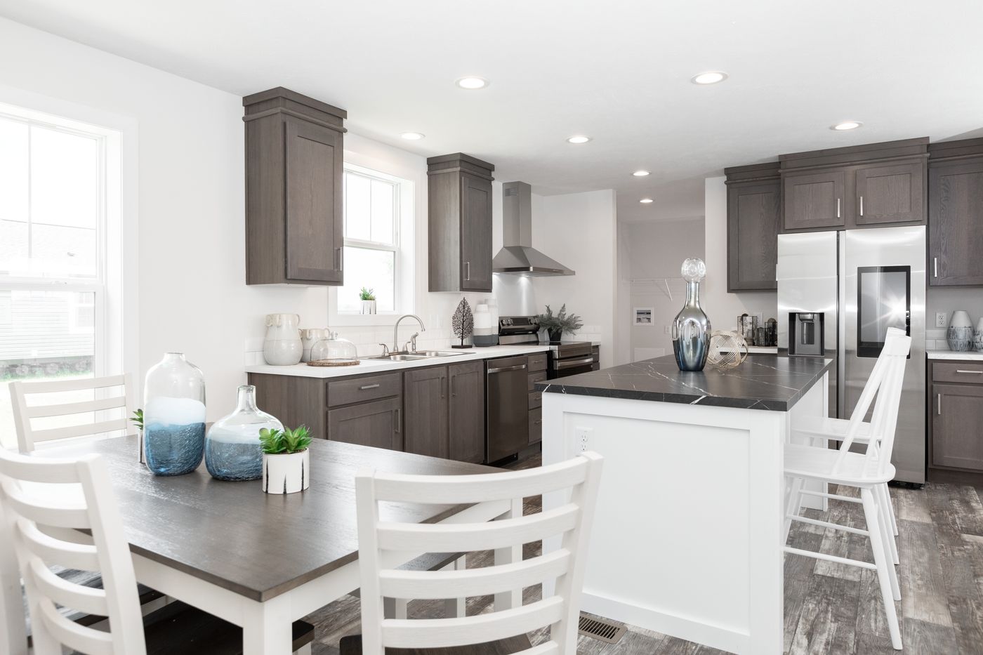 The ECLIPSE/6028-MS063 Dining Area. This Manufactured Mobile Home features 3 bedrooms and 2 baths.