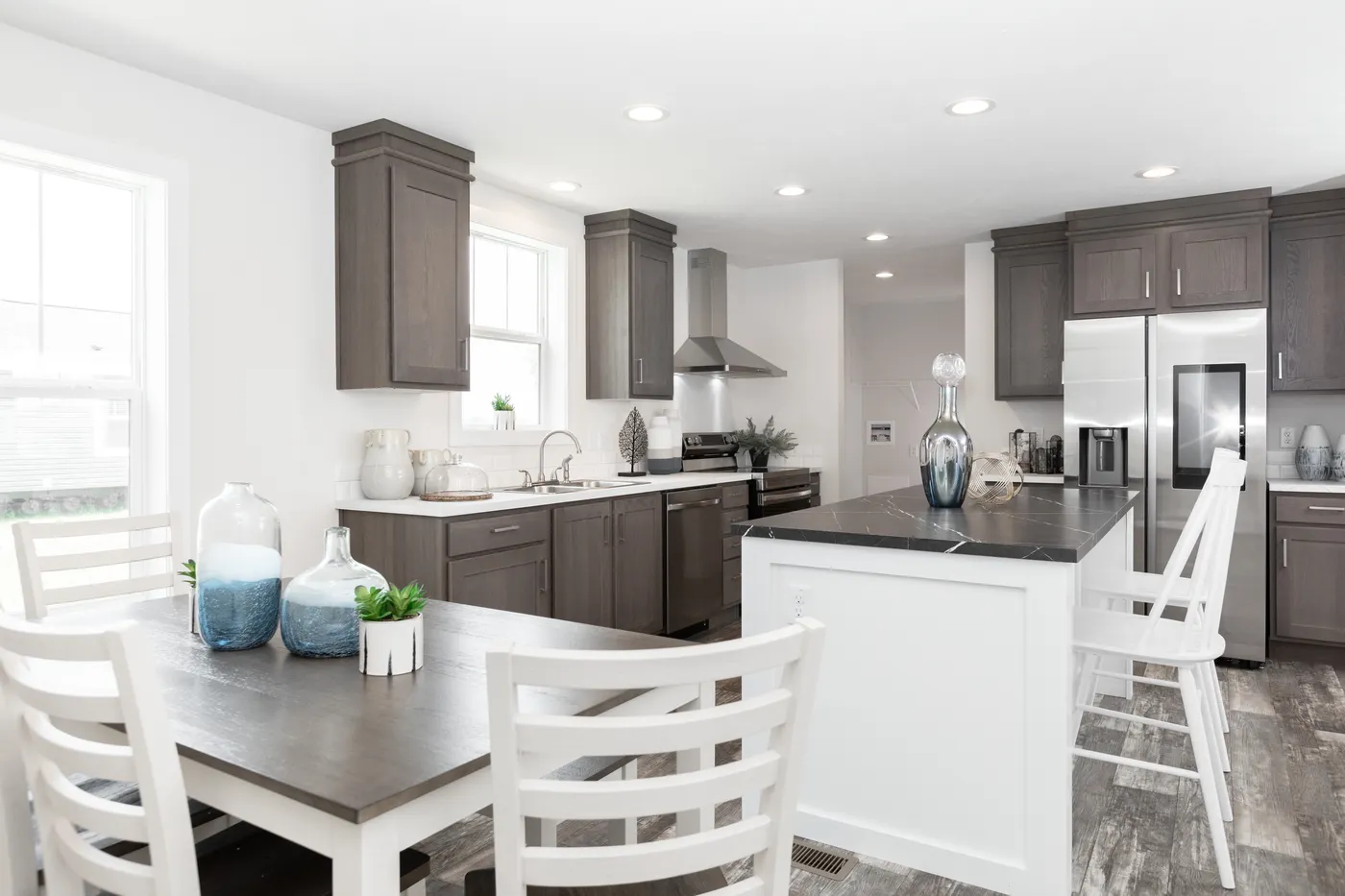 The ECLIPSE/6028-MS063 Dining Area. This Manufactured Mobile Home features 3 bedrooms and 2 baths.