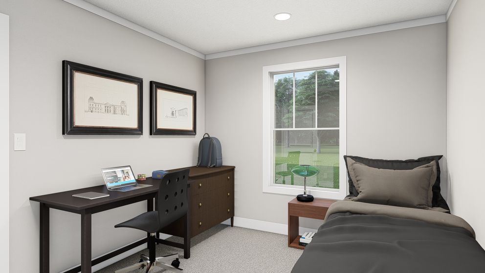 The HERE COMES THE SUN Guest Bedroom. This Manufactured Mobile Home features 3 bedrooms and 2 baths.