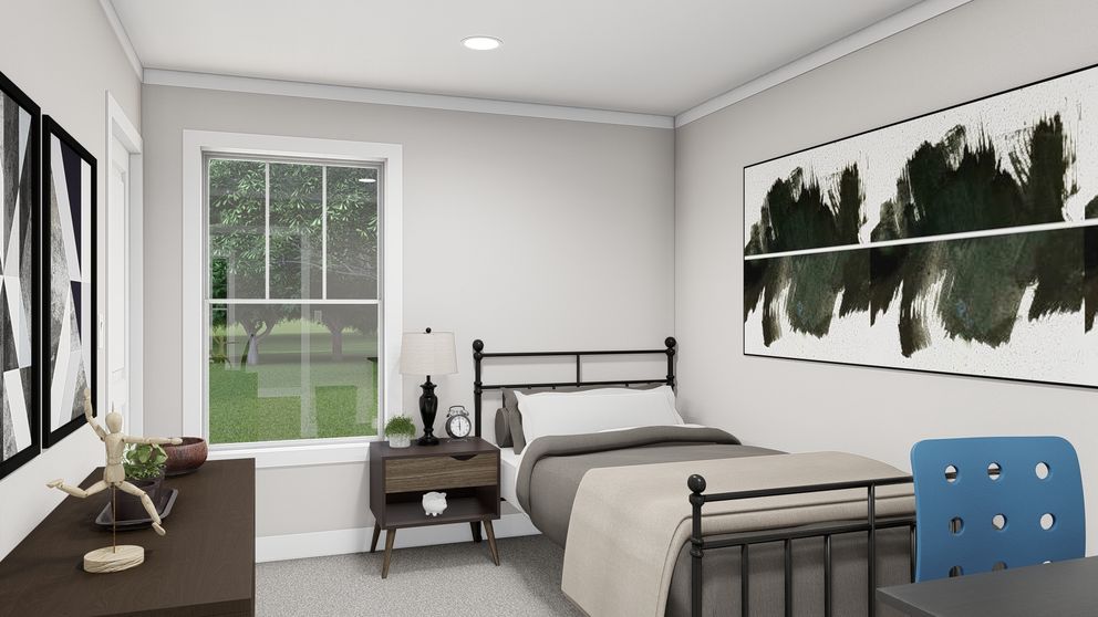 The LET IT BE Guest Bedroom. This Manufactured Mobile Home features 3 bedrooms and 2 baths.