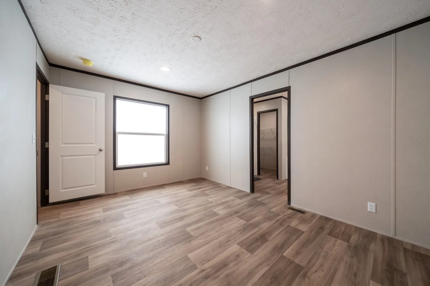 The DYNAMIC Bedroom. This Manufactured Mobile Home features 3 bedrooms and 2 baths.