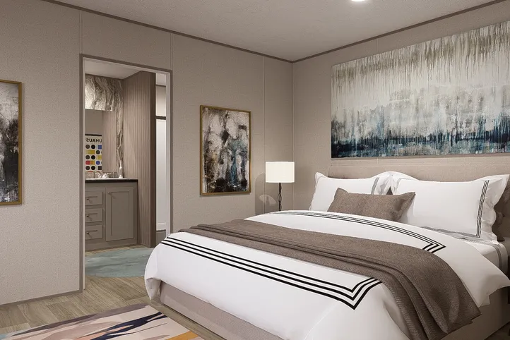The BLAZER 66 F Primary Bedroom. This Manufactured Mobile Home features 3 bedrooms and 2 baths.