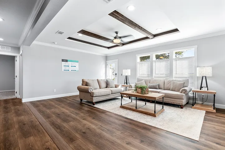 The THE VAIL Living Room. This Manufactured Mobile Home features 3 bedrooms and 2 baths.