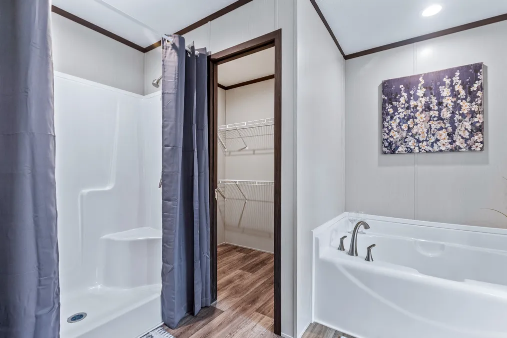 The INTUITION Primary Bathroom. This Manufactured Mobile Home features 3 bedrooms and 2 baths.