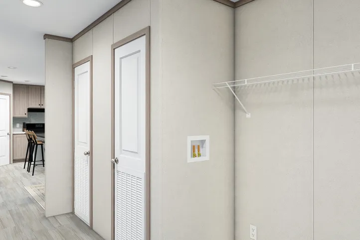 The 4828-E746 THE PULSE Utility Room. This Manufactured Mobile Home features 3 bedrooms and 2 baths.