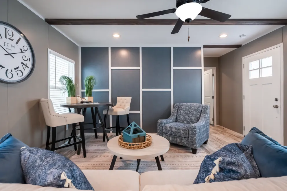 The LIBERTY Living Room. This Manufactured Mobile Home features 3 bedrooms and 2 baths.