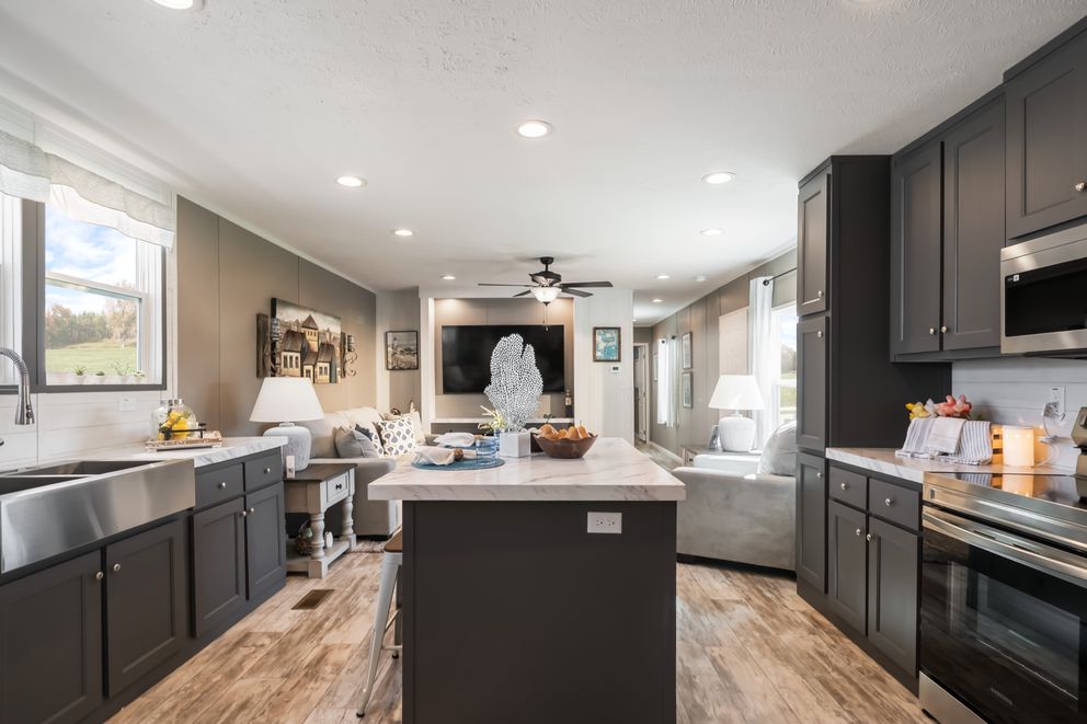 The THE DRIFTWOOD Kitchen. This Manufactured Mobile Home features 3 bedrooms and 2 baths.