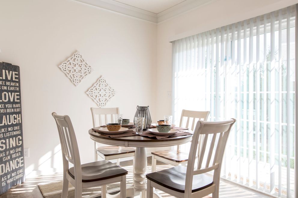The 1558 JAMESTOWN Dining Area. This Manufactured Mobile Home features 3 bedrooms and 2 baths.