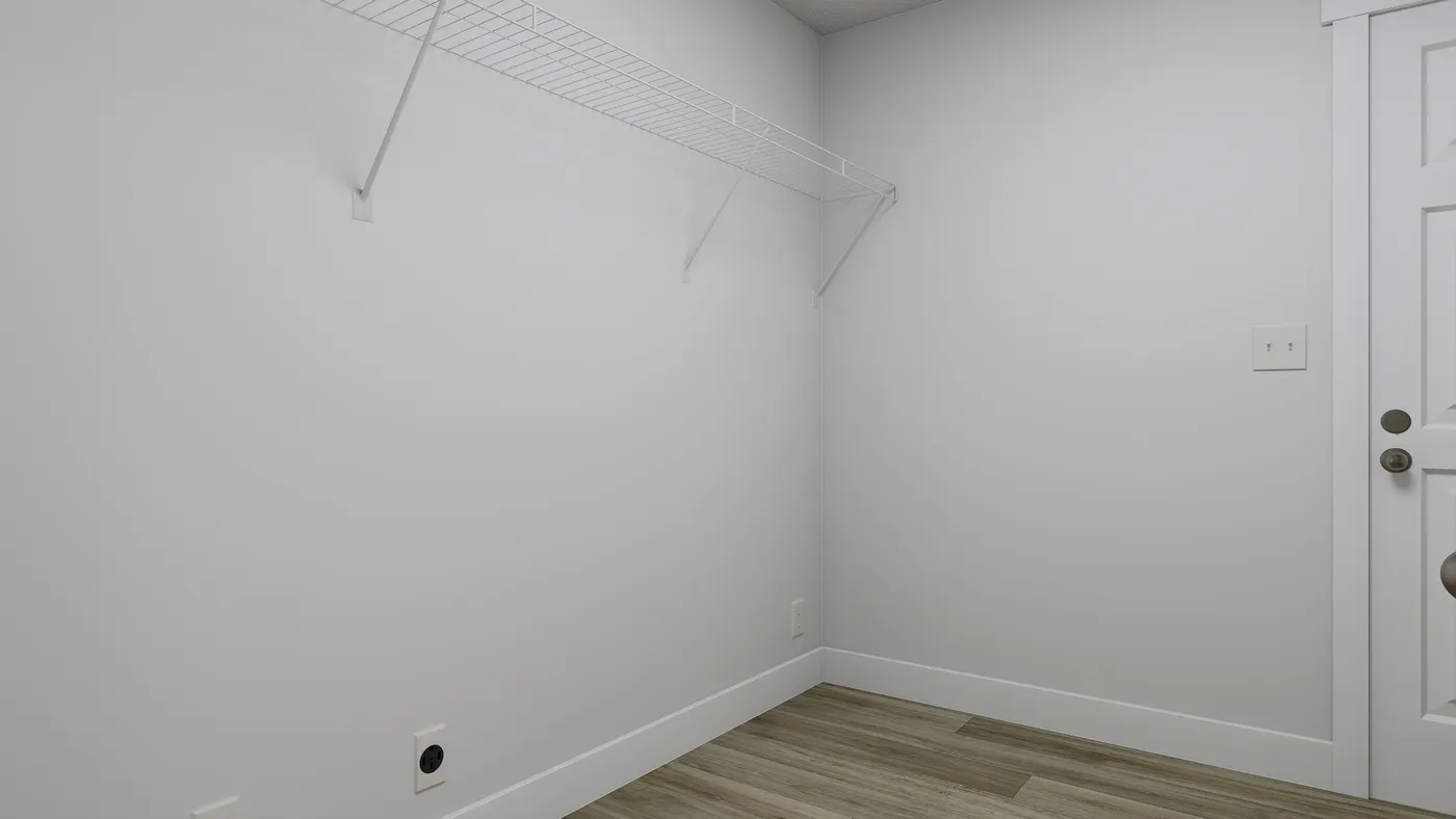 The RIGHT CHOICE 75 Utility Room. This Manufactured Mobile Home features 4 bedrooms and 2 baths.