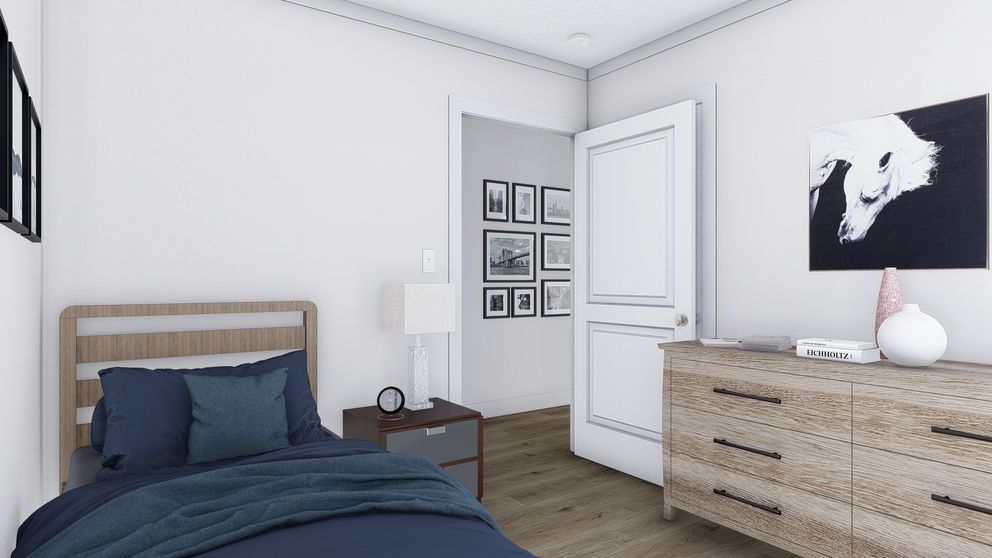 The HEY JUDE Guest Bedroom. This Manufactured Mobile Home features 4 bedrooms and 2 baths.