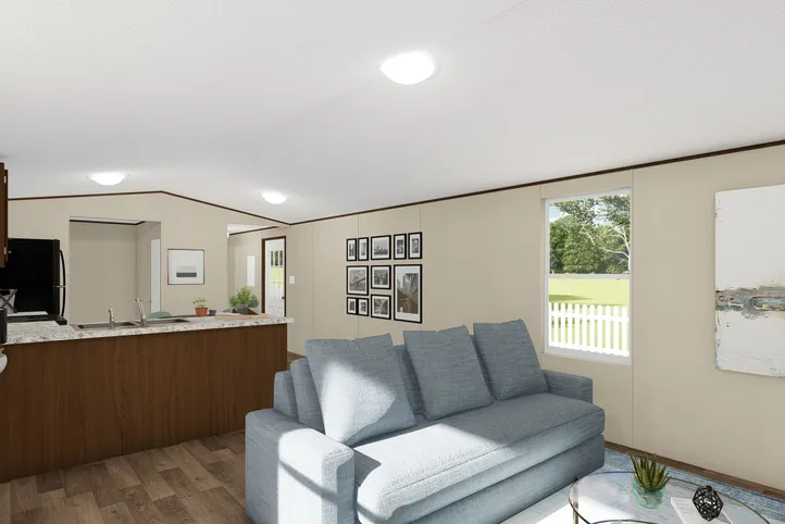 The BLISS Living Room. This Manufactured Mobile Home features 2 bedrooms and 1 bath.