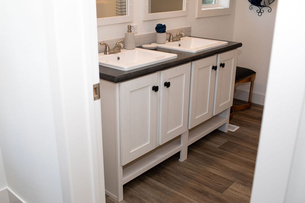 The BROWN EYED GIRL Primary Bathroom. This Manufactured Mobile Home features 4 bedrooms and 2 baths.