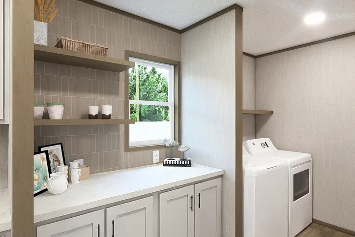 The MOROCCO Utility Room. This Manufactured Mobile Home features 4 bedrooms and 2 baths.