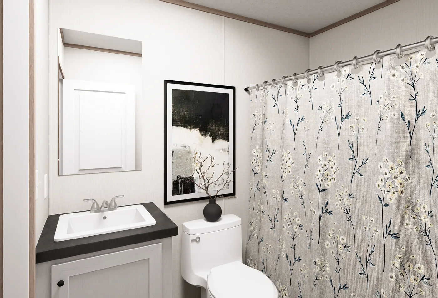 The OASIS Guest Bathroom. This Manufactured Mobile Home features 3 bedrooms and 2 baths.