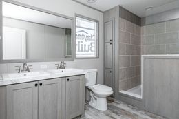 The BOLT Primary Bathroom. This Manufactured Mobile Home features 4 bedrooms and 2 baths.