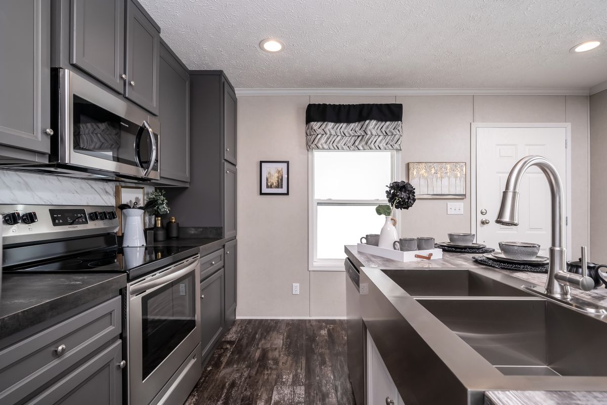 The RIVERVIEW Exterior. This Manufactured Mobile Home features 2 bedrooms and 2 baths.