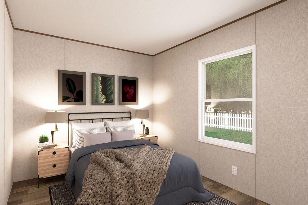 The CYPRESS Guest Bedroom. This Manufactured Mobile Home features 4 bedrooms and 2 baths.