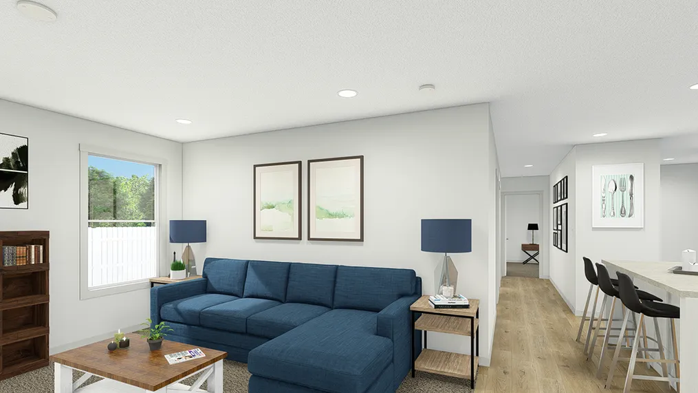 The UNDER PRESSURE Living Room. This Manufactured Mobile Home features 3 bedrooms and 2 baths.