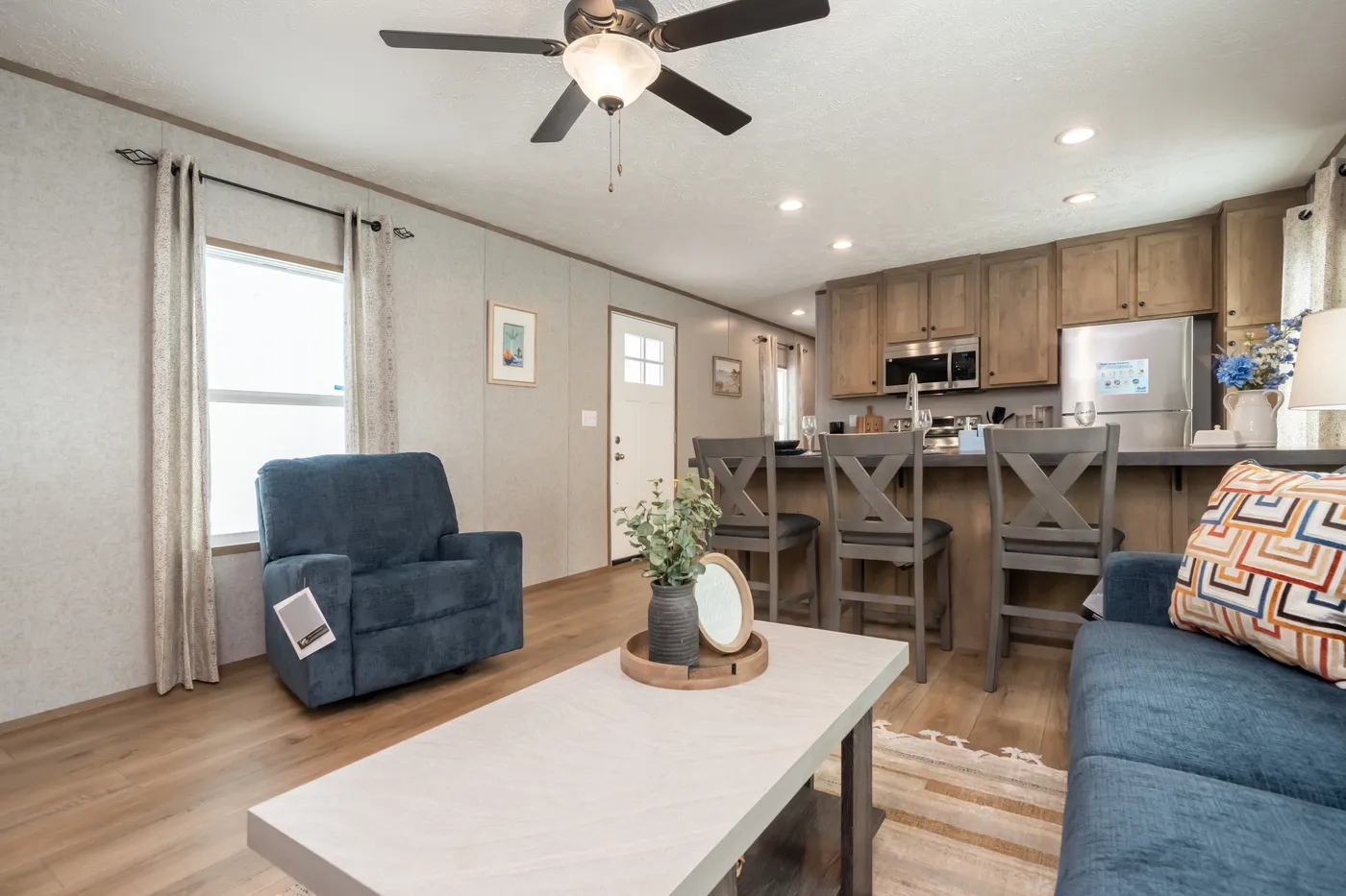 The WARRIOR II Living Room. This Manufactured Mobile Home features 2 bedrooms and 2 baths.