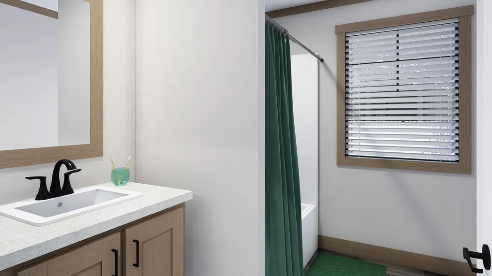 The WILDER Guest Bathroom. This Manufactured Mobile Home features 3 bedrooms and 2 baths.