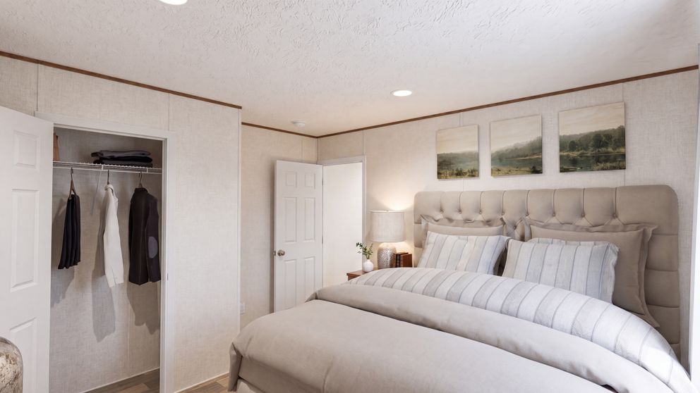 The ELM Primary Bedroom. This Manufactured Mobile Home features 2 bedrooms and 1 bath.