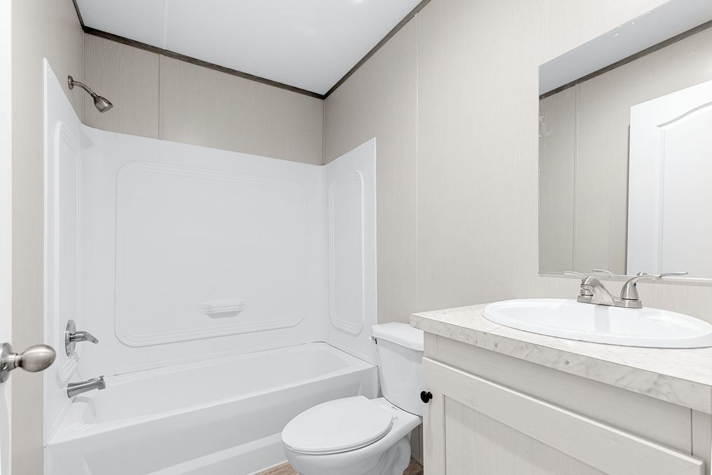 The BREEZE 16763A Guest Bathroom. This Manufactured Mobile Home features 3 bedrooms and 2 baths.