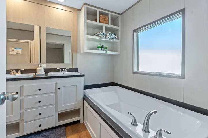 The RESOLUTION 16763X Primary Bathroom. This Manufactured Mobile Home features 3 bedrooms and 2 baths.