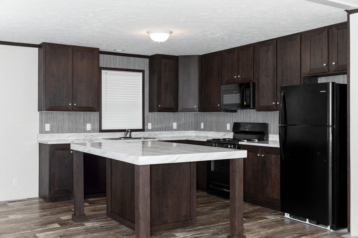 The 4828-746 THE PULSE Kitchen. This Manufactured Mobile Home features 3 bedrooms and 2 baths.