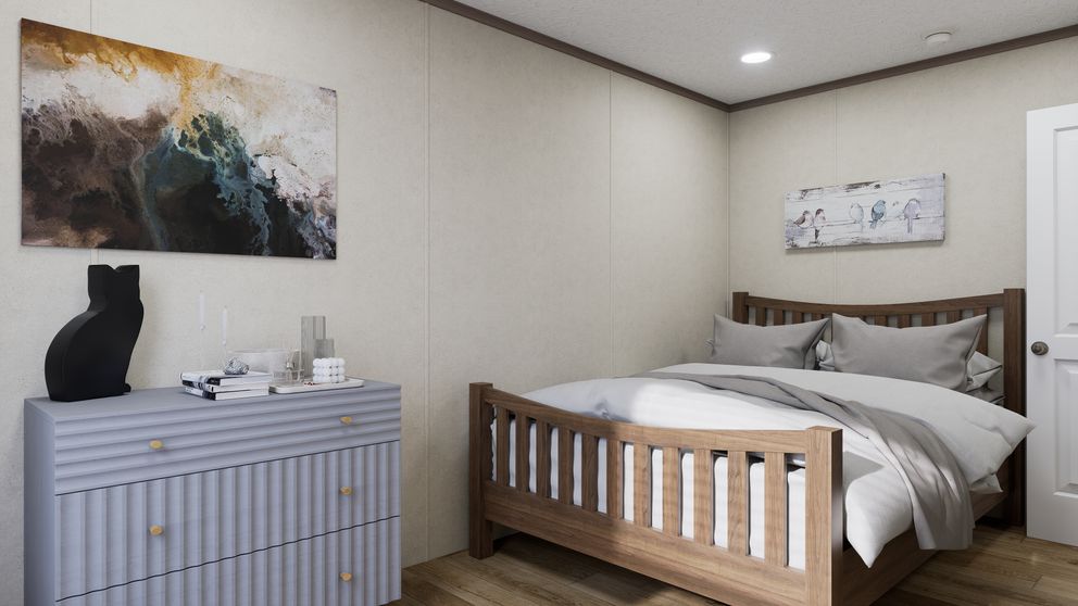 The 4816-CC05 OASIS 48 Primary Bedroom. This Manufactured Mobile Home features 2 bedrooms and 1 bath.