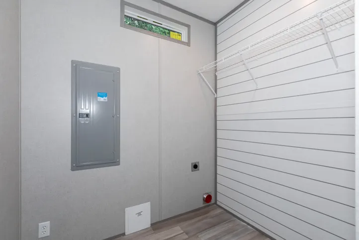 The THE ANNIVERSARY 76 Utility Room. This Manufactured Mobile Home features 3 bedrooms and 2 baths.