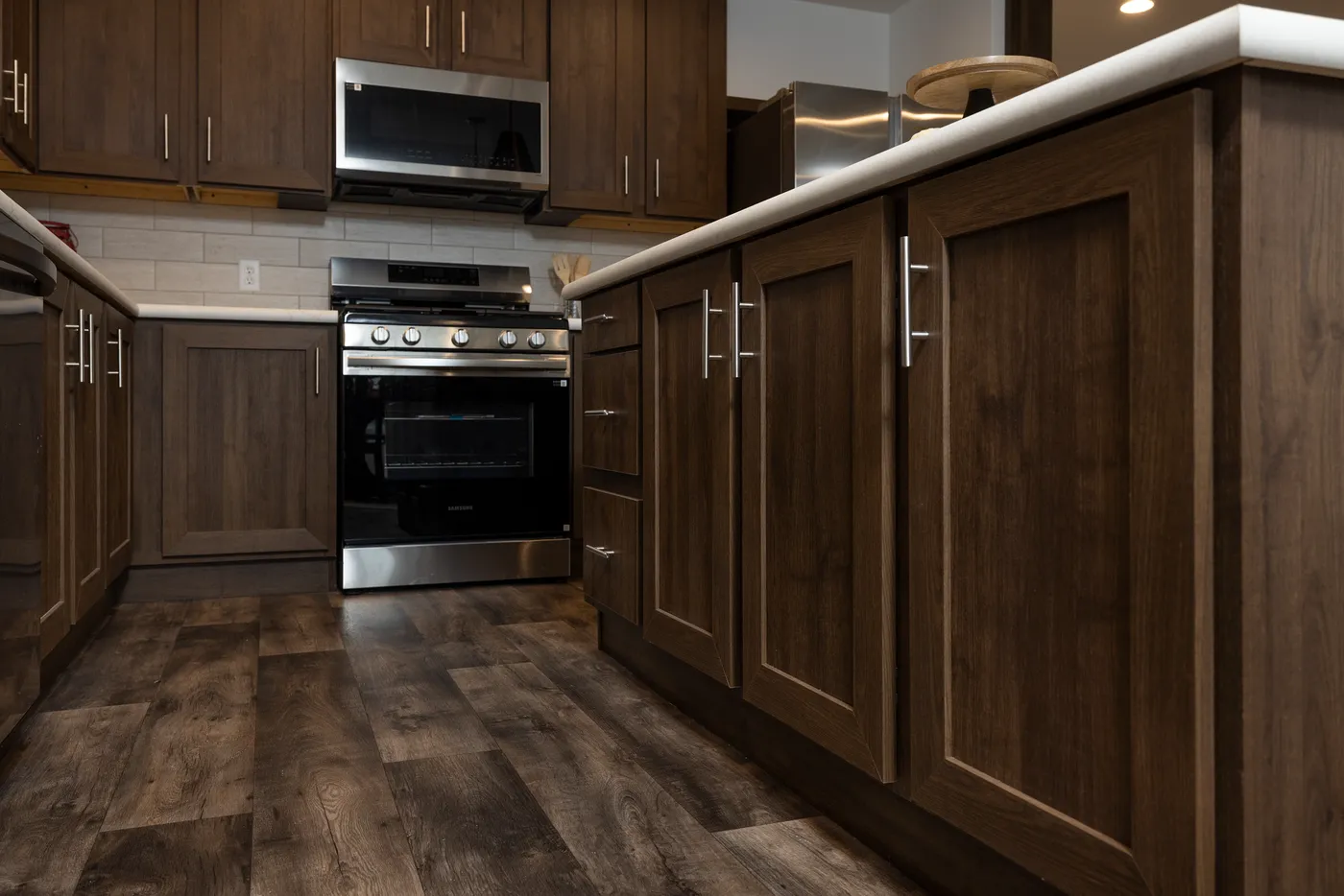 The RAMSEY 75 Kitchen. This Manufactured Mobile Home features 4 bedrooms and 2 baths.