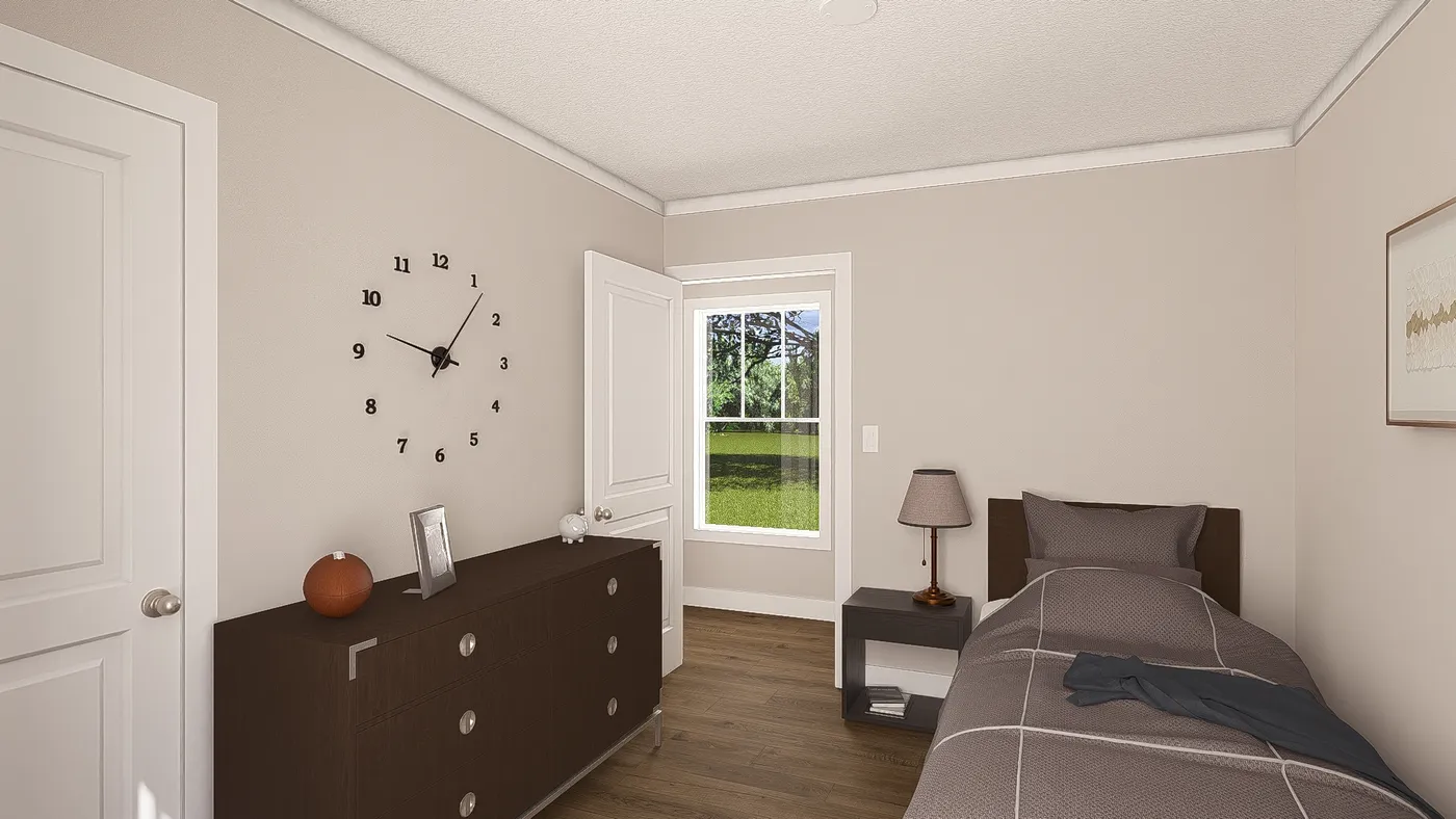 The SWEET CAROLINE Guest Bedroom. This Manufactured Mobile Home features 3 bedrooms and 2 baths.