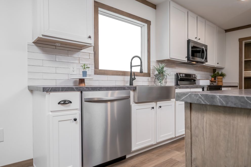 The THE LIZZIE Kitchen. This Manufactured Mobile Home features 3 bedrooms and 2 baths.