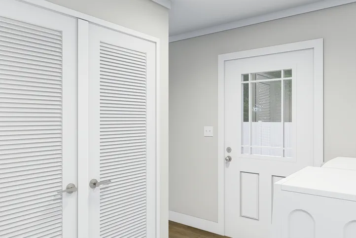 The CLASSIC 60B Utility Room. This Manufactured Mobile Home features 3 bedrooms and 2 baths.