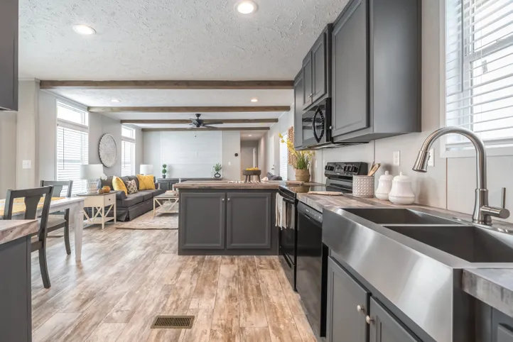 The ANNIVERSARY CHOICE Kitchen. This Manufactured Mobile Home features 3 bedrooms and 2 baths.