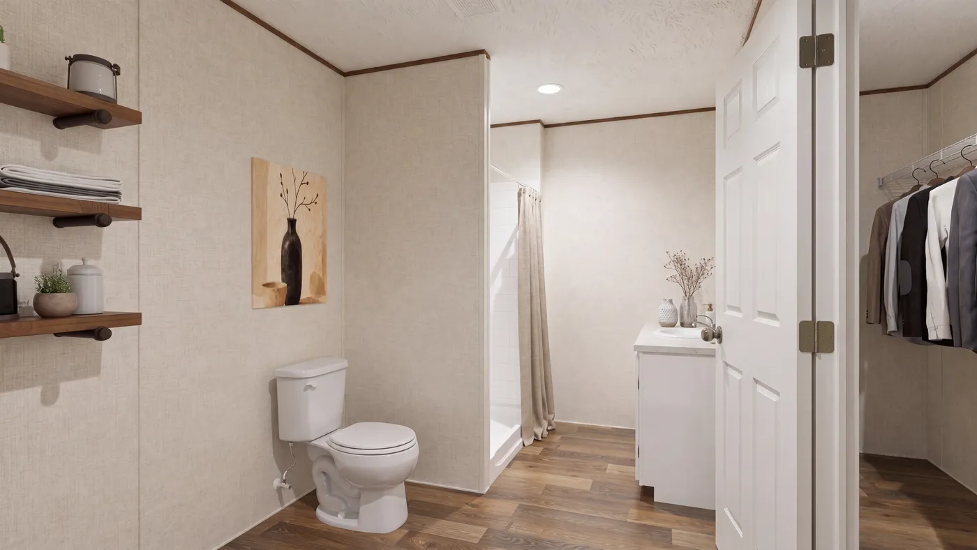 The OAK Primary Bathroom. This Manufactured Mobile Home features 4 bedrooms and 2 baths.