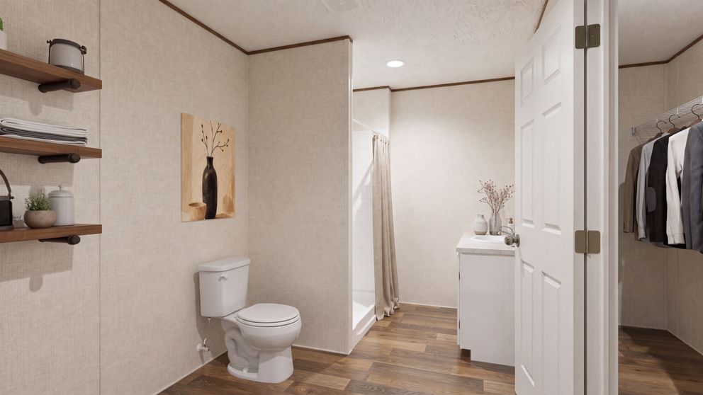 The OAK Primary Bathroom. This Manufactured Mobile Home features 4 bedrooms and 2 baths.