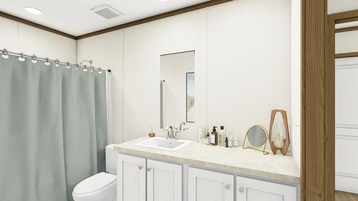 The THE EMPOWER Guest Bathroom. This Manufactured Mobile Home features 4 bedrooms and 2 baths.
