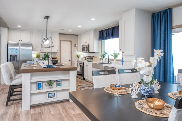 The EL SUENO BREEZE Kitchen. This Manufactured Mobile Home features 4 bedrooms and 2 baths.