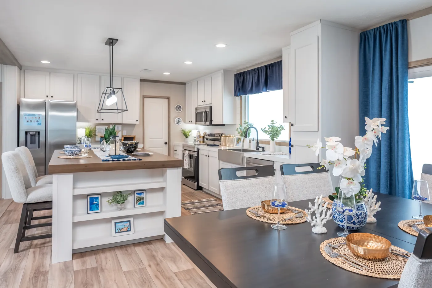 The EL SUENO BREEZE Kitchen. This Manufactured Mobile Home features 4 bedrooms and 2 baths.