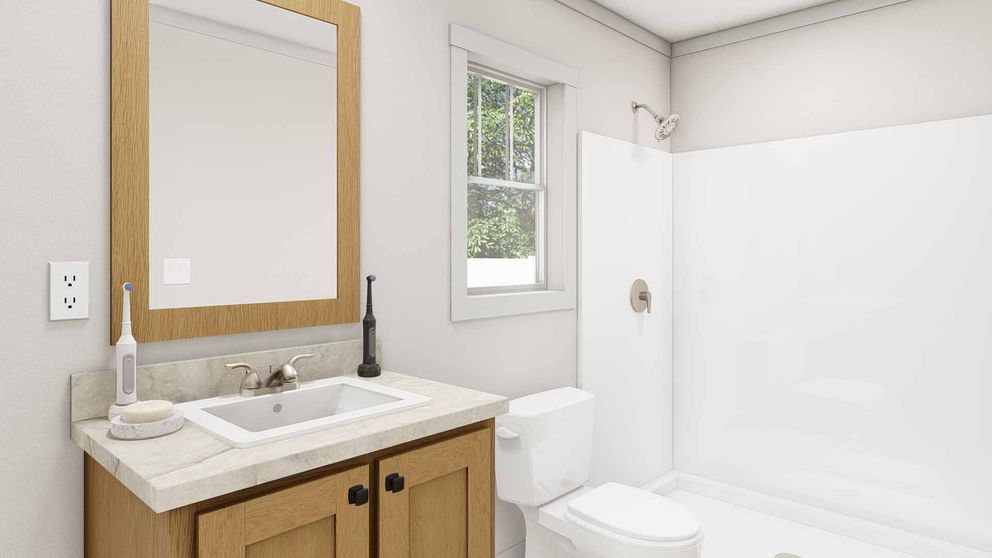 The RHYTHM NATION Primary Bathroom. This Manufactured Mobile Home features 3 bedrooms and 2 baths.