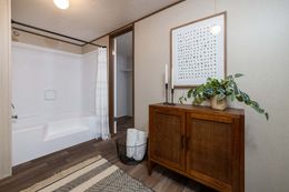 The PRIDE Primary Bathroom. This Manufactured Mobile Home features 4 bedrooms and 2 baths.