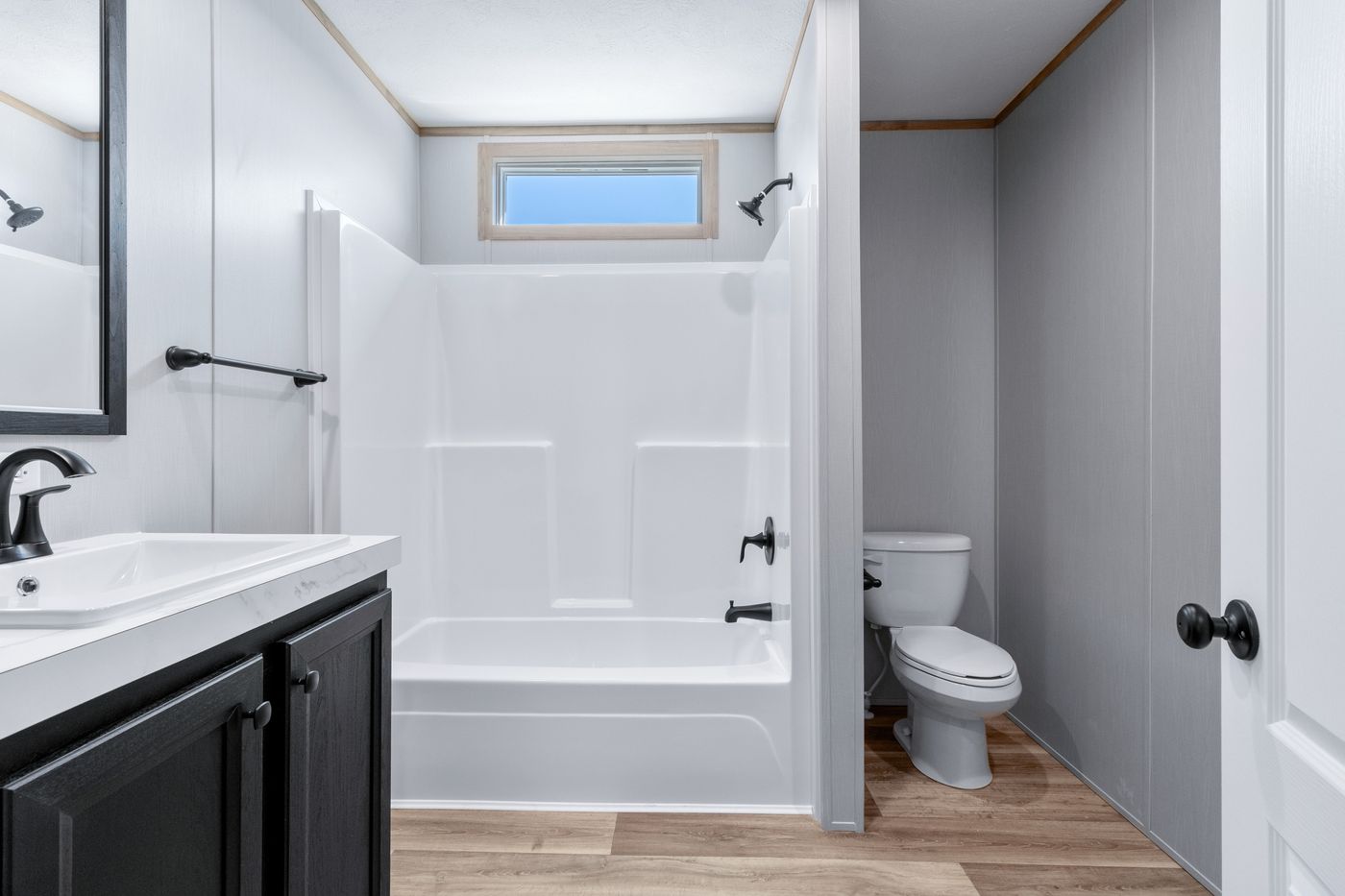 The ANATOLIA XL Guest Bathroom. This Manufactured Mobile Home features 3 bedrooms and 2 baths.