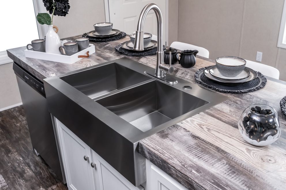 The RIVERVIEW Exterior. This Manufactured Mobile Home features 2 bedrooms and 2 baths.