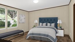 The WONDER Primary Bedroom. This Manufactured Mobile Home features 4 bedrooms and 2 baths.