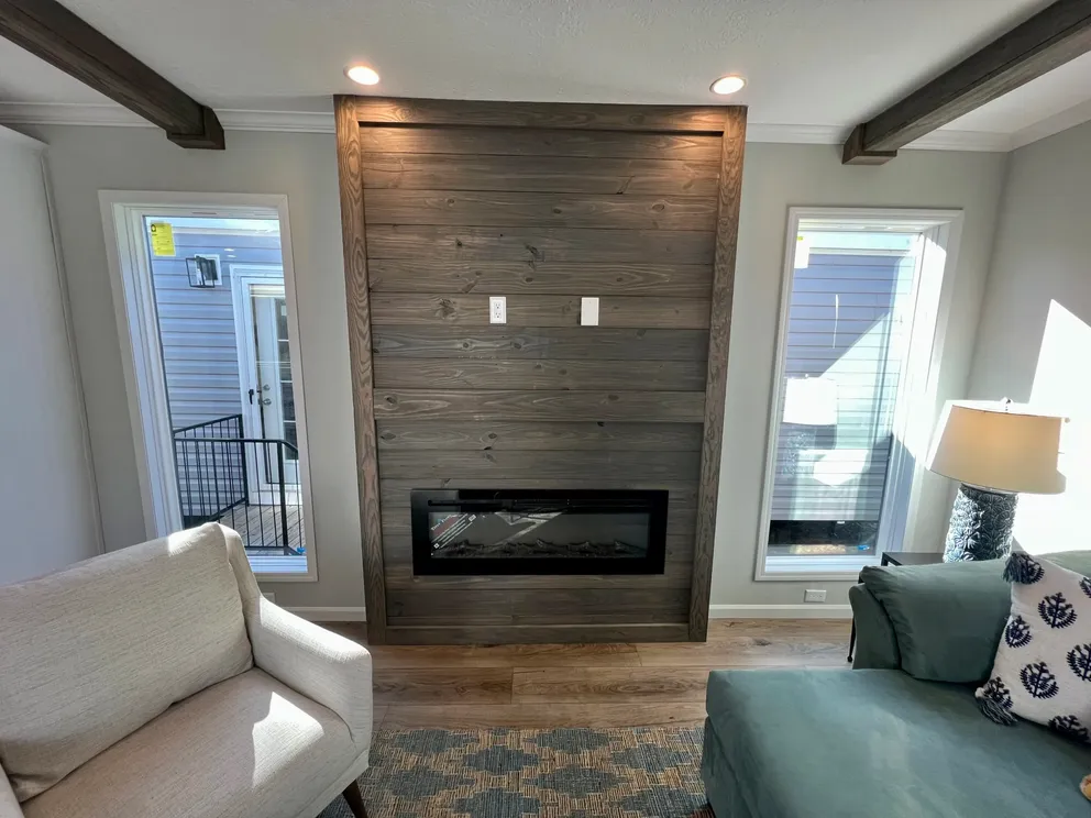 The THE TRUMAN Living Room. This Manufactured Mobile Home features 3 bedrooms and 2 baths.