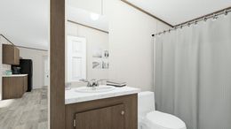 The THRILL Guest Bathroom. This Manufactured Mobile Home features 3 bedrooms and 2 baths.